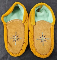 Handcrafted beaded moccasins 